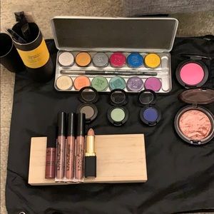 Lightly used makeup and brand new brush set